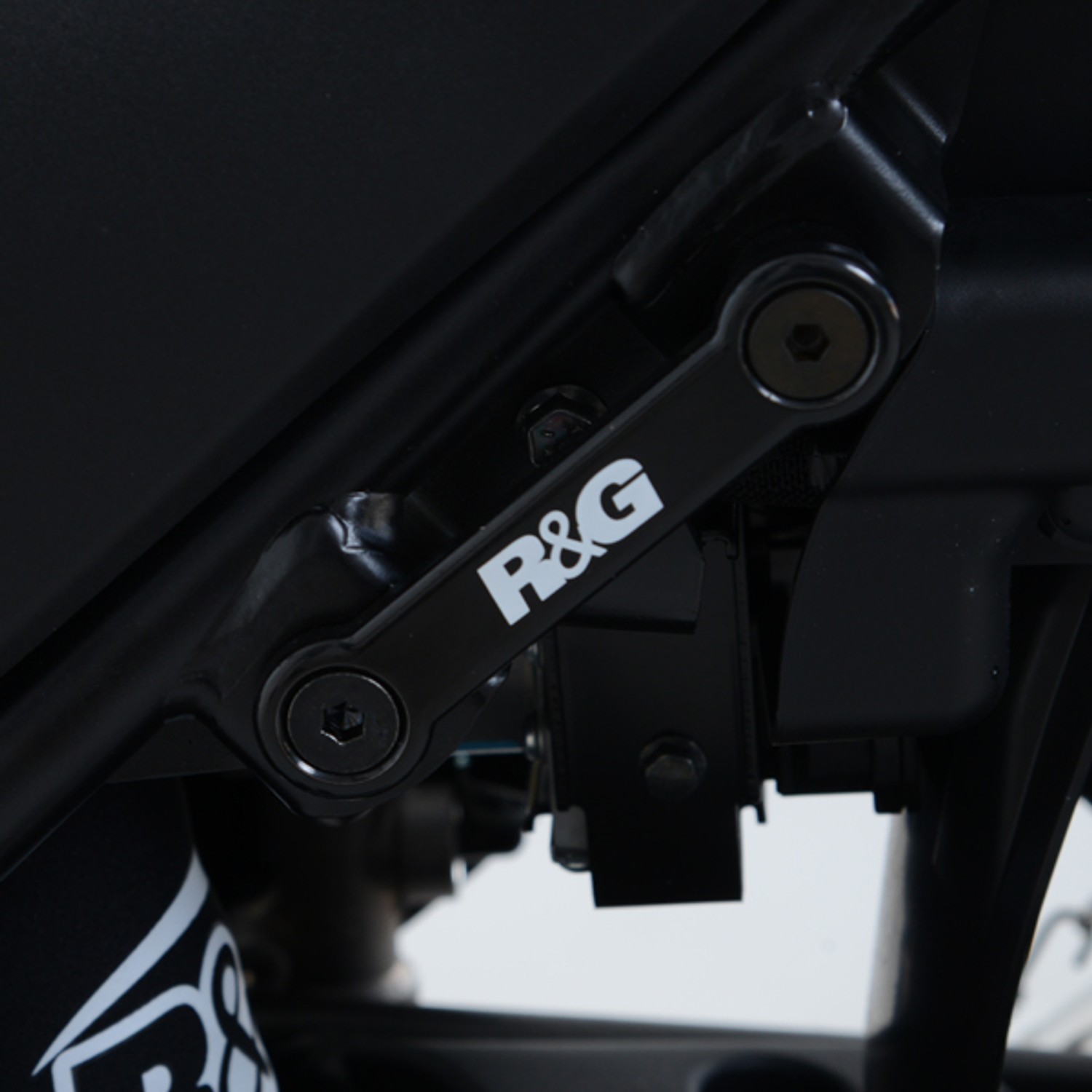 R&G Racing Rear Footrest Blanking Plate (Left Side) for the Suzuki SV650/SV650X '16-'22 R&G Racing Rear Footrest Blanking Plate (Left Side) for the Suzuki SV650/SV650X '16-'22